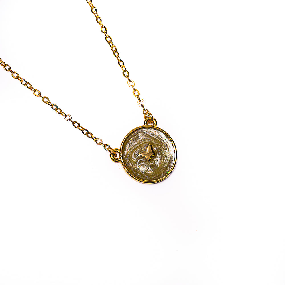 Butterfly Disc Necklace in 18k gold plated brass by Made Design Jewelry