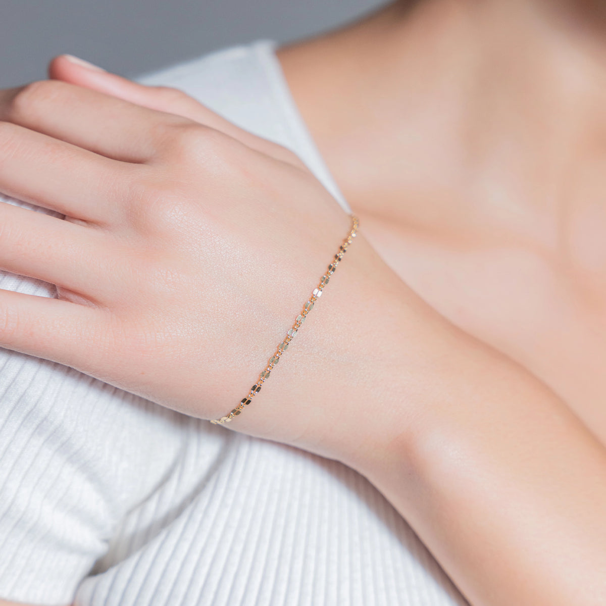 Split Disc 14K gold-filled bracelet worn on wrist