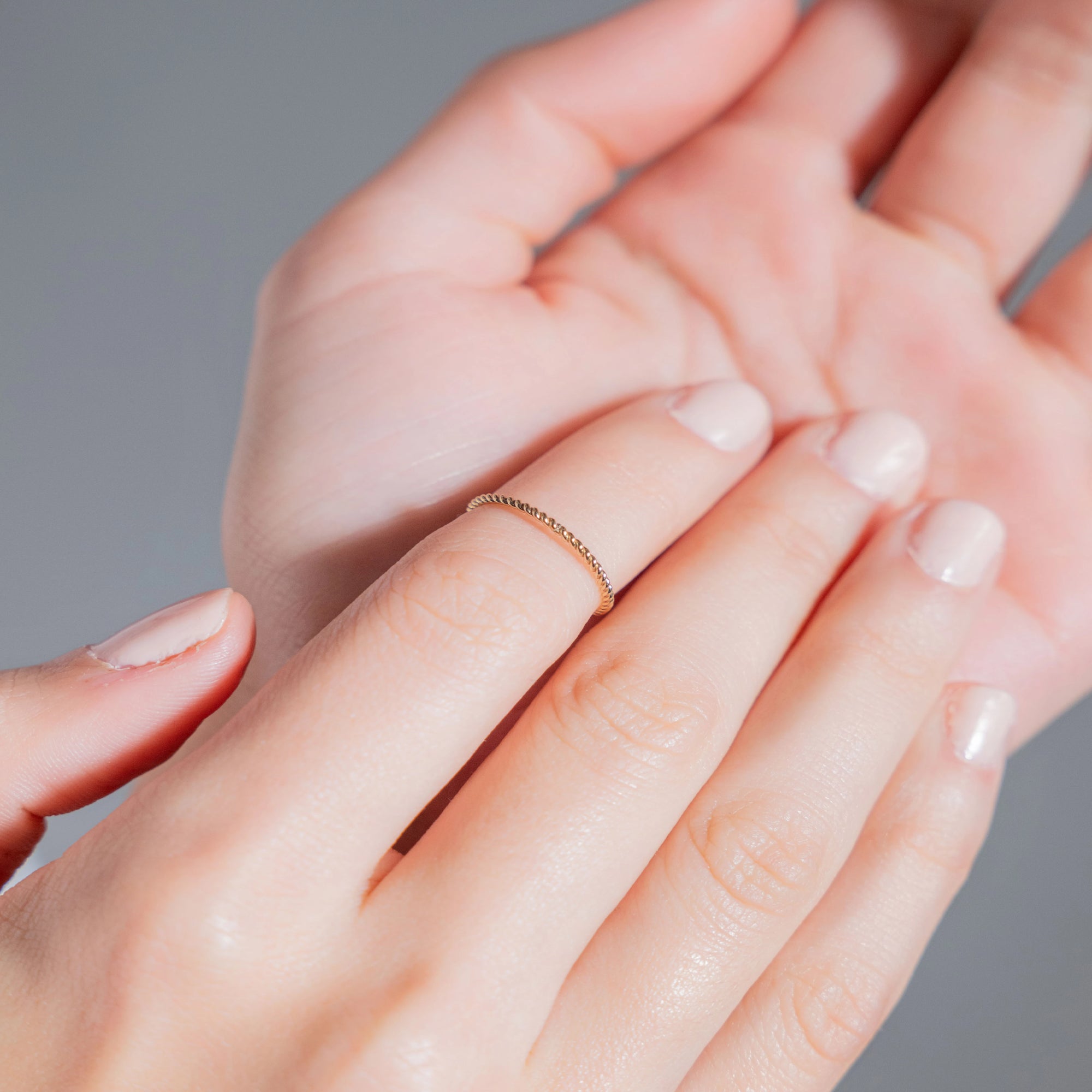 Hand-formed twisted gold-filled stacking ring detail