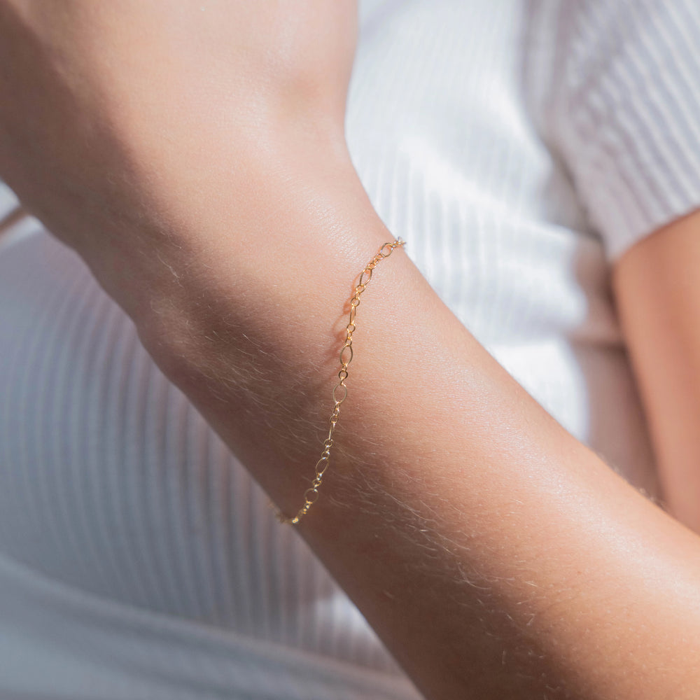 Mixed Oval Loop 14K gold-filled bracelet worn on wrist