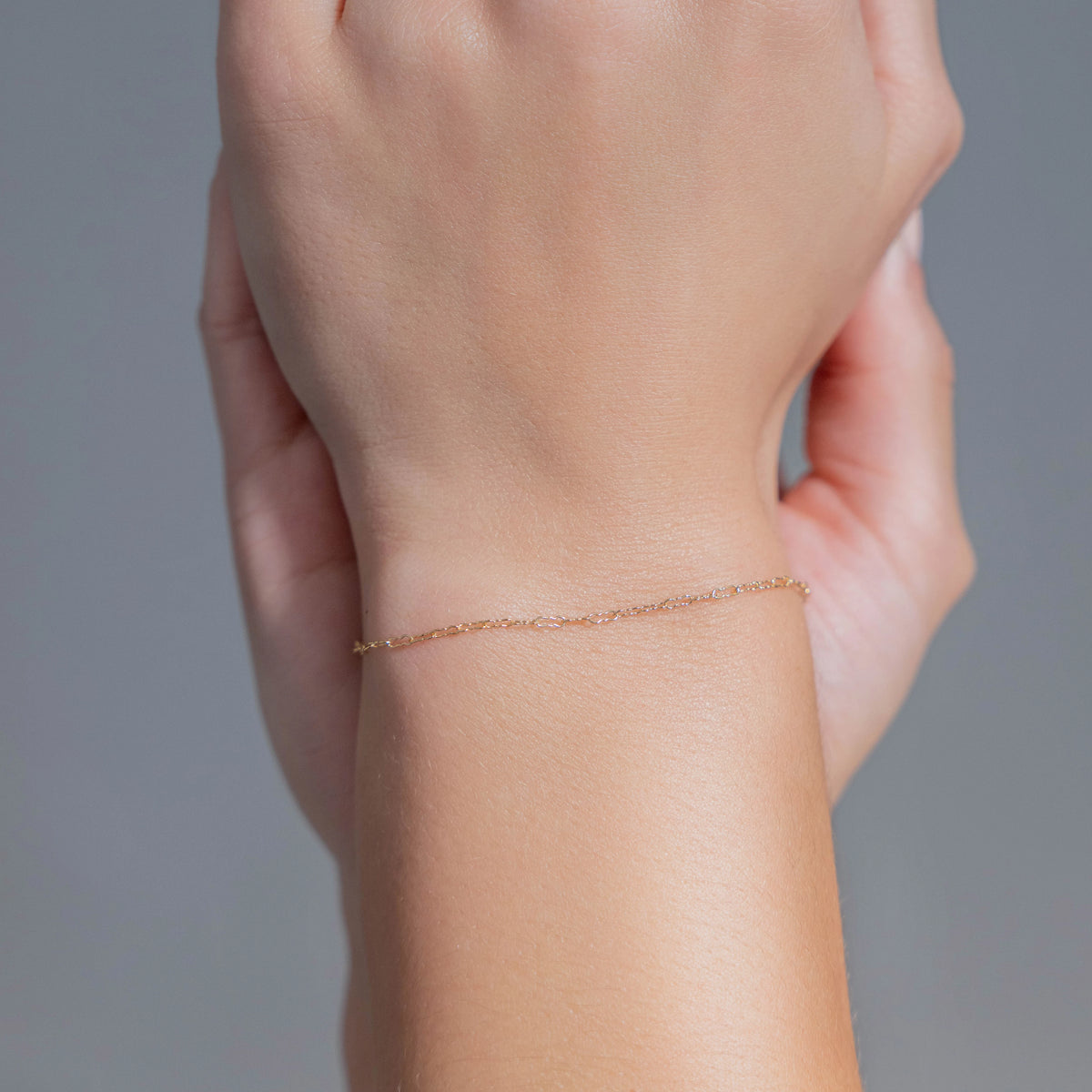 Triple Circle 14K gold-filled bracelet worn on wrist