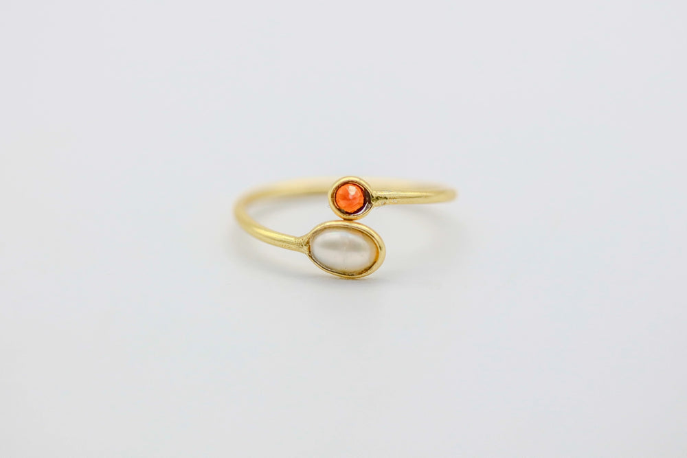 Garnet & Opal Infinity Ring by Made Design Jewelry